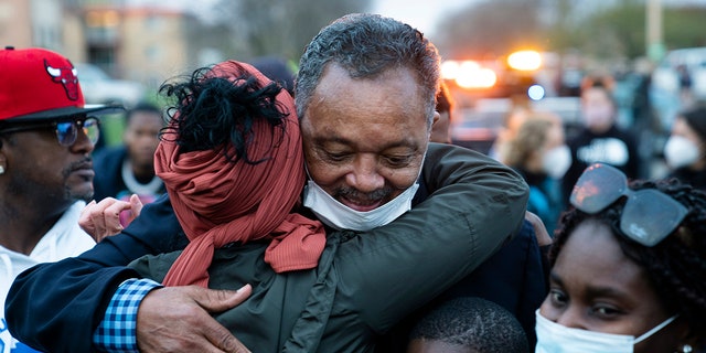 The Rev. Jesse Jackson greets demonstrators during a protest April 17, 2021, in Brooklyn Center, Minn. (Associated Press)