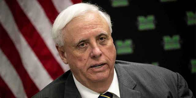 ,Jim Justice, West Virginia’s Republican governor signed a bill Wednesday that bans transgender athletes from competing in female sports in middle and high schools and colleges.