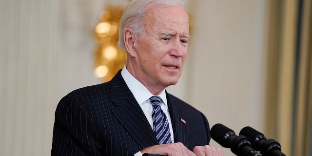 President Biden delivers remarks about vaccinations, in the State Dining Room of the White House, Tuesday, April 6, 2021, in Washington. (AP Photo/Evan Vucci)