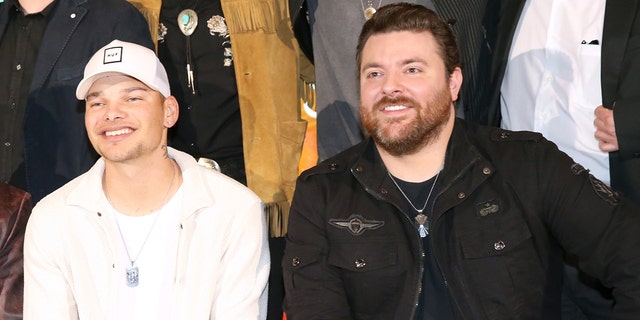 Chris Young surprised Kane Brown on stage during a recent concert to honor frontline workers.