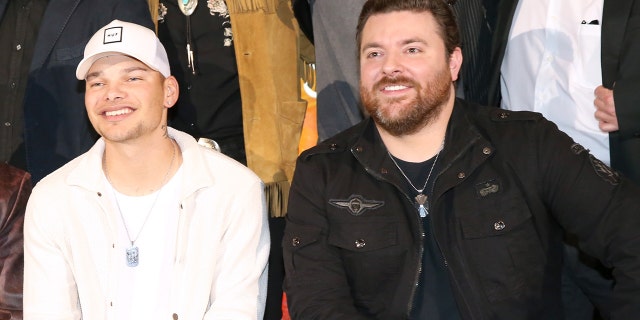 Chris Young surprised Kane Brown on stage during a recent concert to honor frontline workers.