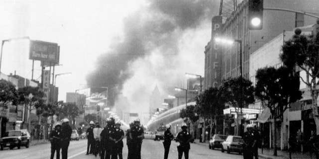 LOS ANGELES, CALIFORNIA - MAY 1: Police guard Hollywood Boulevard after the Rodney King incident sparked riots. Photographed May 1, 1992 in Los Angeles, CA. (Photo by Dayna Smith / The Washington Post via Getty Images)