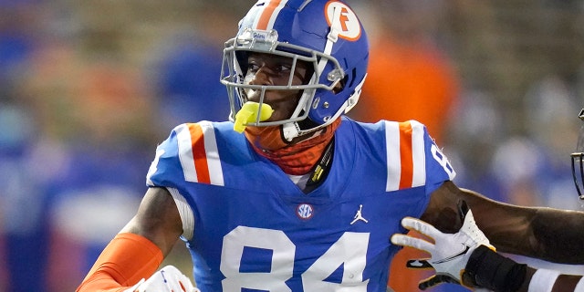 FILE - Florida tight end Kyle Pitts (84) breaks free from a Missouri defender as he runs a pass pattern during the first half of an NCAA college football game in Gainesville, Fla., in this Saturday, Oct. 31, 2020, file photo. Pitts is a possible first round pick in the NFL Draft, April 29-May 1, 2021, in Cleveland. (AP Photo/John Raoux, File)
