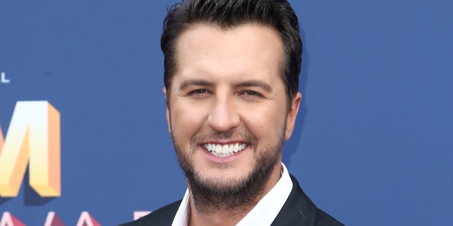 Luke Bryan won his third entertainer of the year award from the Academy of Country Music on Sunday, drawing mixed reactions from viewers. (Photo by Tommaso Boddi/Getty Images)