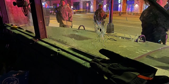 A Minnesota National Guard vehicle was struck by a bullet Sunday morning. The suspected attacker faces assault charges.