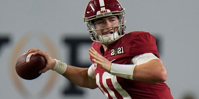 FILE - Alabama quarterback Mac Jones passes against Ohio State during the second half of an NCAA College Football Playoff national championship game in New Orleans, in this Monday, Jan. 11, 2021, file photo. Jones is a likely first round pick in the NFL Draft, April 29-May 1, 2021, in Cleveland.(AP Photo/Chris O'Meara, File)