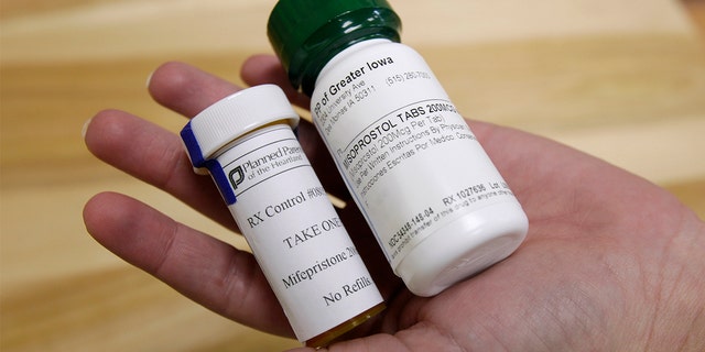 This Sept. 22, 2010, file photo shows bottles of the abortion-inducing drug RU-486 at a clinic in Des Moines, Iowa. (AP Photo/Charlie Neibergall)