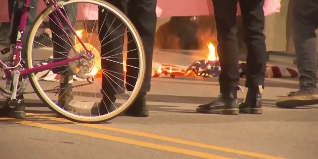 Durham, North Carolina protesters set fire near police headquarters.