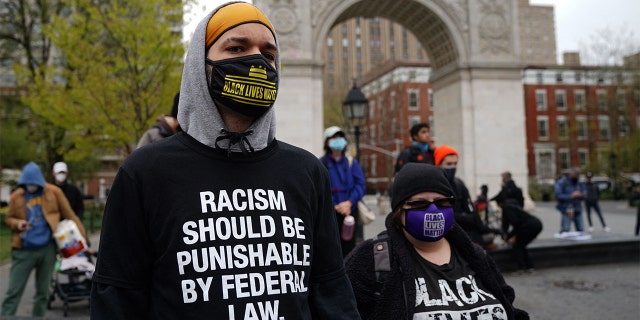 Protestors gather in Washington Square Park in New York April 12, 2021 during a protest after a suburban Minneapolis police officer fatally shot 20-year-old Daunte Wright during a traffic stop.