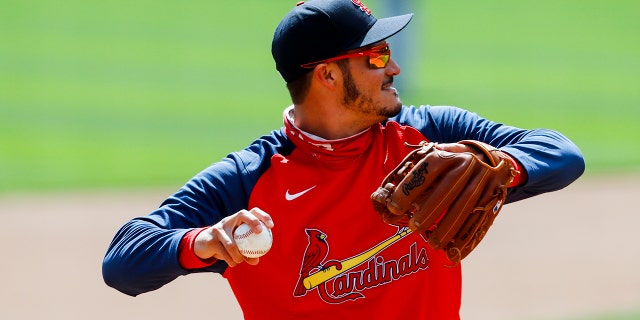 St. Louis Cardinals' Nolan Arenado throws during a baseball team workout in Cincinnati, Wednesday, March 31, 2021. The Cardinals play in an opening day game at the Cincinnati Reds on Thursday. (AP Photo/Aaron Doster)