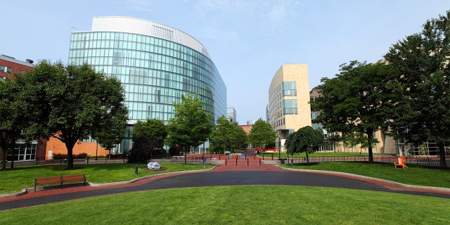 Northeastern University in Boston, Mass. Northeastern is one of many colleges that charge over $50,000 in tuition, room and board per year. Many blame the increased cost of a college education on government subsidies.