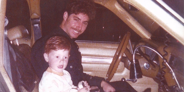 Officer Michael Pavelka and young Matthew Pavelka.