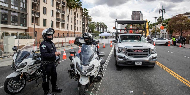 Police officers stand outside Union Station for the Academy Awards on Sunday, April 25, 2021 in Los Angeles, CA. (Brian van der Brug / Los Angeles Times via Getty Images)