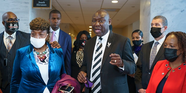 Civil rights attorney Ben Crump, who represented the George Floyd family, is joined by family members of victims of racial injustice following a meeting with Sen. Tim Scott, R-S.C., who is working on a police reform bill in the Senate, at the Capitol in Washington, Thursday, April 29, 2021. At left are Philonise Floyd, brother of George Floyd, and Gwen Carr, mother of Eric Garner who was killed by a New York Police Department officer using a prohibited chokehold during his arrest. 