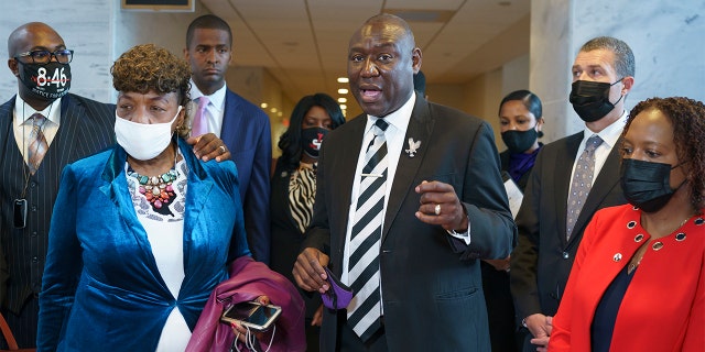 Civil rights attorney Ben Crump, who represented the George Floyd family, is joined by family members of victims of racial injustice following a meeting with Sen. Tim Scott, R-S.C., who is working on a police reform bill in the Senate, at the Capitol in Washington, Thursday, April 29, 2021. At left are Philonise Floyd, brother of George Floyd, and Gwen Carr, mother of Eric Garner who was killed by a New York Police Department officer using a prohibited chokehold during his arrest.