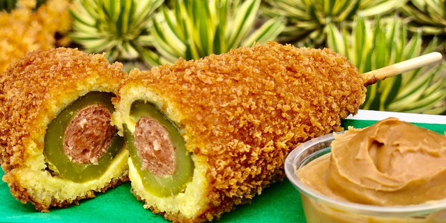 The Pickle Corn Dog, which can be found at Disneyland’s Blue Ribbon Corn Dogs Cart in Downtown Disney, is described as a "panko-crusted dill pickle corn dog served with a side of peanut butter."