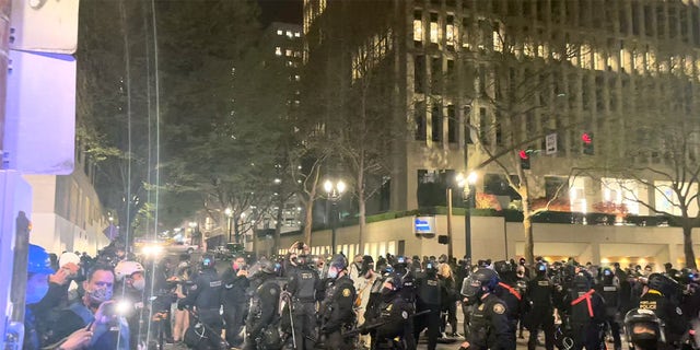 Armed private security fills police void in downtown Portland where ...