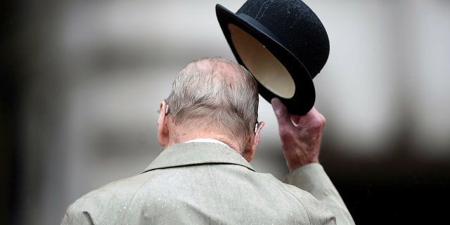 FILE - In this Wednesday Aug. 2, 2017 file photo, Britain's Prince Philip, in his role as Captain General of the Royal Marines, attends a Parade on the forecourt of Buckingham Palace, in central London. Buckingham Palace says Prince Philip, husband of Queen Elizabeth II, has died aged 99. (Hannah McKay/Pool via AP, File)
