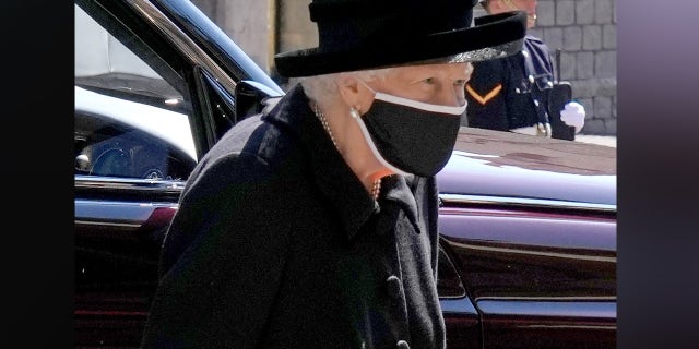 Queen Elizabeth II arrives for the funeral service of Britain's Prince Philip, Duke of Edinburgh inside St George's Chapel in Windsor Castle in Windsor, west of London, on April 17, 2021. Philip, who was married to Queen Elizabeth II for 73 years, died on April 9 aged 99 just weeks after a month-long stay in hospital for treatment to a heart condition and an infection. 