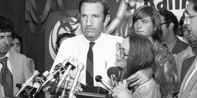 Ramsey Clark, Democratic candidate for the US Senate, center, speaks at the Lincoln Center in New York City, September 14, 1976. (Associated Press)