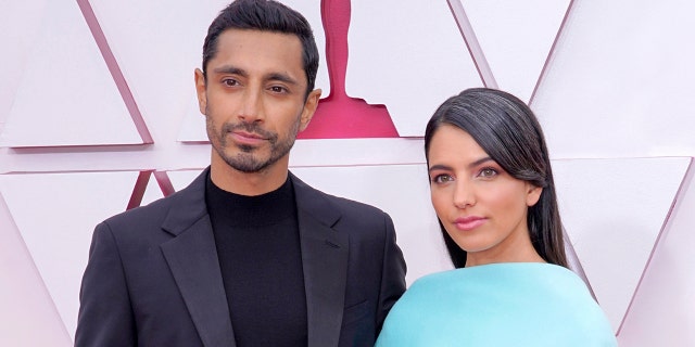 Actor Riz Ahmed and author Fatima Farheen Mirza married at some point over the last year and made their red carpet debut at the Academy Awards. (Photo by Chris Pizzello-Pool/Getty Images)