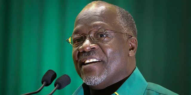FILE - In this Saturday, July 11, 2015 file photo, Tanzania's then public works minister and presidential candidate John Magufuli speaks at an internal party poll to decide the ruling Chama Cha Mapinduzi (CCM) party's presidential candidate, which they later chose him to be, in Dodoma, Tanzania. (AP Photo/Khalfan Said, File)
