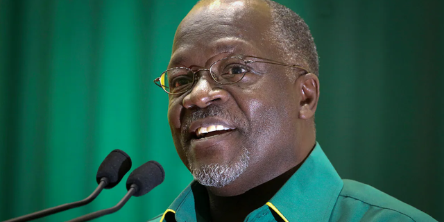 FILE - In this Saturday, July 11, 2015 file photo, Tanzania's then public works minister and presidential candidate John Magufuli speaks at an internal party poll to decide the ruling Chama Cha Mapinduzi (CCM) party's presidential candidate, which they later chose him to be, in Dodoma, Tanzania. (AP Photo/Khalfan Said, File)