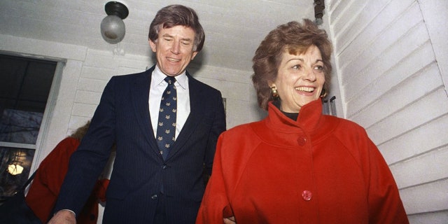 FILE - In this Dec. 15, 1987 file photo, Former Colorado Sen. Gary Hart and his wife Lee are all smiles as they leave the home, Dec. 15, 1987 of a Concord supporter enroute to the New Hampshire Secretary of State's office in Concord, N.H.. Lee Hart, the wife of former U.S. Sen. Gary Hart of Colorado, has died Friday, April 9, 2021 . She was 85.(AP Photo/Chris Cardner)
