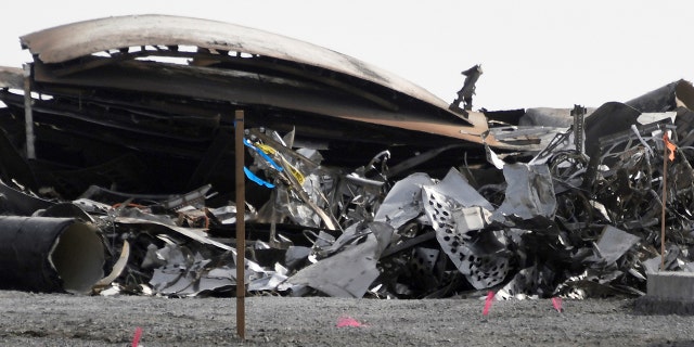 Debris is recovered from a National Wildlife Refuge after uncrewed SpaceX Starship prototype rocket SN11 failed to land safely, in Boca Chica, Texas, U.S. March 31,2021. REUTERS/Gene Blevins