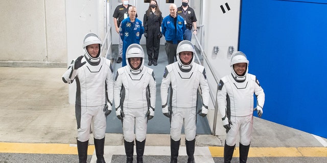 From left to right, ESA (European Space Agency) astronaut Thomas Pesquet, NASA astronauts Megan McArthur and Shane Kimbrough, and Japan Aerospace Exploration Agency (JAXA) astronaut Akihiko Hoshide, wearing SpaceX spacesuits, are seen as they prepare to depart the Neil A. Armstrong Operations and Checkout Building for Launch Complex 39A during a dress rehearsal prior to the Crew-2 mission launch, Sunday, April 18, 2021, at NASA’s Kennedy Space Center in Florida. Photo Credit: (NASA/Aubrey Gemignani)