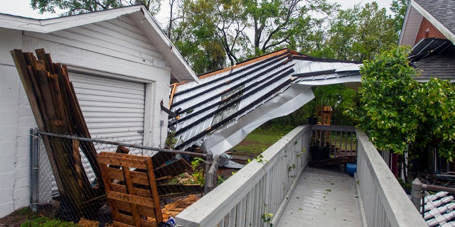 A powerful storm ripped off the roof of Emerald Coast Brewing on West Government Street in Pensacola early on Saturday, April 10, 2021. Part of the roof landed at the business next door.Emerald Republic Brewing Roof Dammage 5