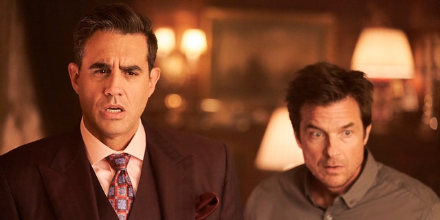 Bobby Cannavale as The King (L) and Jason Bateman as The Crab (R) 