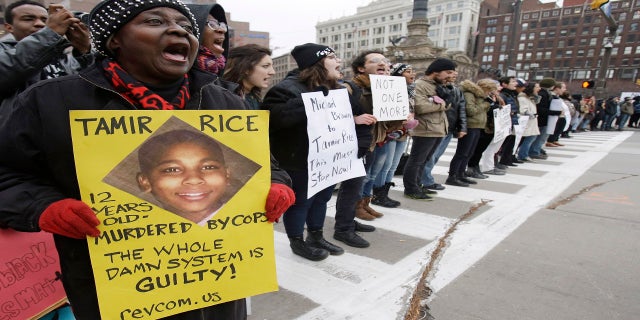 This 2014 photo shows demonstrators blocking Public Square in Cleveland during a protest over the police shooting of 12-year-old Tamir Rice. (AP)