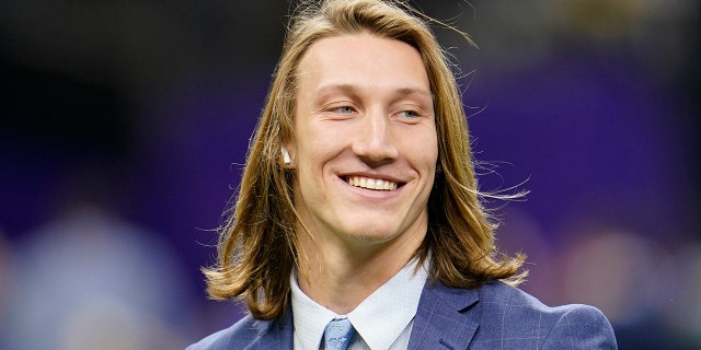 FILE - Clemson quarterback Trevor Lawrence arrives before the NCAA College Football Playoff national championship game against LSU in New Orleans, in this Monday, Jan. 13, 2020, file photo. Lawrence is a likely top pick in the NFL Draft, April 29-May 1, 2021, in Cleveland. (AP Photo/David J. Phillip, File)