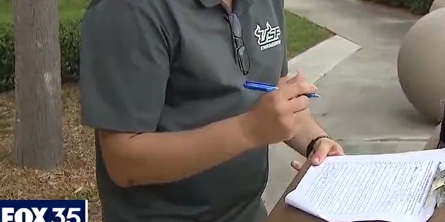 Man signs petition to make masks optional in schools (Credit: Fox 35 Orlando)