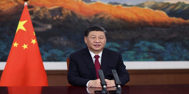 Chinese President Xi Jinping delivers a keynote speech via video for the opening ceremony of the Boao Forum for Asia Annual Conference, in Beijing, on Tuesday. (AP/Xinhua)