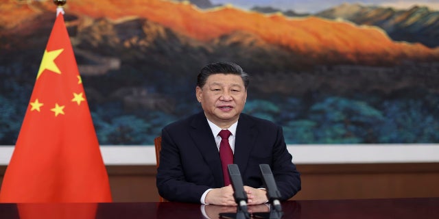 Chinese President Xi Jinping gives a video keynote address at the opening ceremony of the annual Boao Forum for Asia conference in Beijing on Tuesday. (AP / Xinhua)
