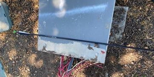 The employee was walking in a residential neighborhood on his work break when he was struck in the back with an arrow by an unknown assailant, authorities said.