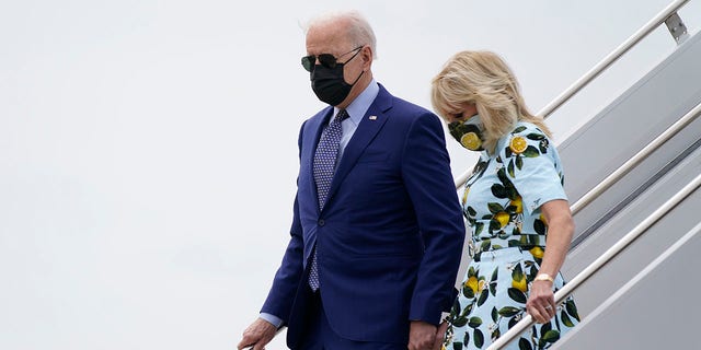President Joe Biden and first lady Jill Biden exits Air Force One as they arrive at Lawson Army Airfield during a trip to mark his 100th day in office, Thursday, April 29, 2021, in Fort Benning, Ga. (AP Photo/Evan Vucci)