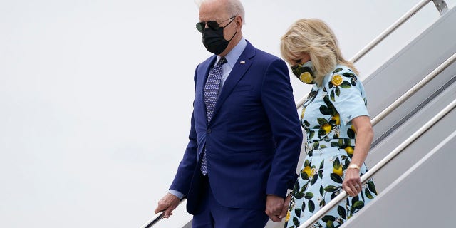 President Joe Biden and first lady Jill Biden exits Air Force One as they arrive at Lawson Army Airfield during a trip to mark his 100th day in office, Thursday, April 29, 2021, in Fort Benning, Ga.