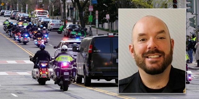 A procession carries the remains of a U.S. Capitol Police officer who was killed after a man rammed a car into two officers at a barricade outside the U.S. Capitol. Police identified the fallen officer as William "Billy" Evans.