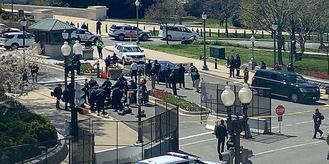 Two stretchers have been rolled out. One went beyond my point of view - the other to the person on the ground. "Exterior security threat" reported at US Capitol.