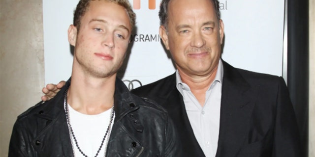 Tom Hanks (R) and his son Chet Hanks arrive for the