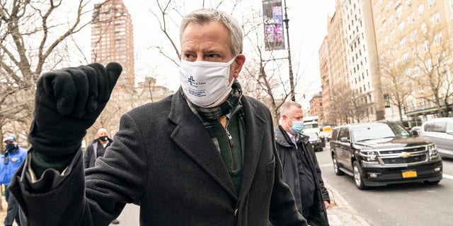 Mayor de Blasio leaves after making an announcement at Delacorte Theater in Central Park in New York on March 16, 2021. (Lev Radin/Sipa USA)