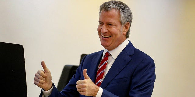 New York City Mayor Bill de Blasio gives a thumbs up after casting his vote for re-election in the Park Slope section of the Brooklyn borough of New York City, on Nov. 7, 2017. REUTERS/Brendan McDermid
