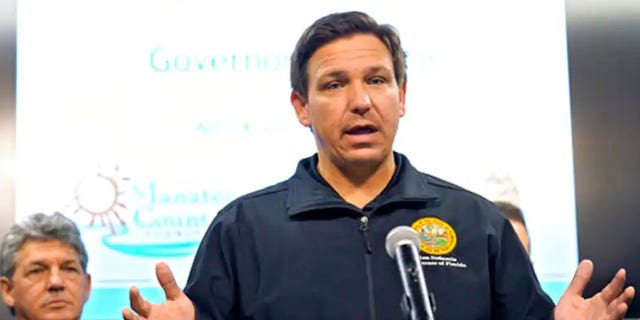 Florida Gov. Ron DeSantis gestures during a news conference Sunday, April 4, 2021, at the Manatee County Emergency Management office in Palmetto, Fla. (Associated Press)