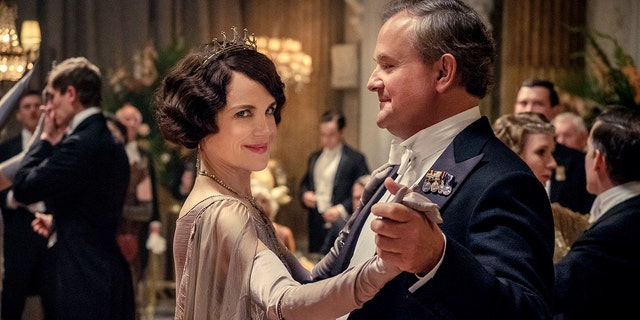 This image released by Focus Features shows Elizabeth McGovern, left, as Lady Grantham and Hugh Bonneville, as Lord Grantham, in "Downton Abbey."