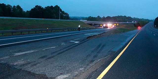 Police said information from the scene indicates that a second vehicle may have been involved in the deadly crash. (Gwinnett County Police Department via AP)