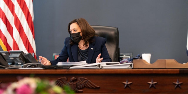 Harris' desk was crafted from materials from the historic USS Constitution warship.
