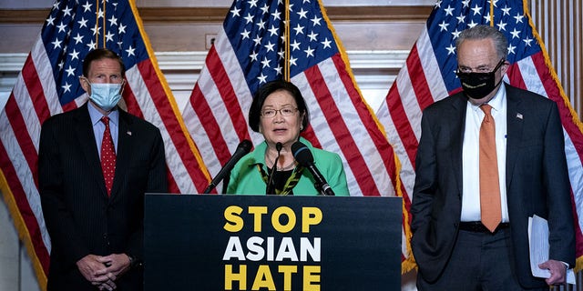 Sen. Mazie Hirono, a Democrat from Hawaii, center, speaks during a news conference at the U.S. Capitol in Washington, D.C., on Thursday, April 22, 2021. The Senate passed by an overwhelming margin legislation designed to combat hate crimes in the U.S., as lawmakers united to respond after a sharp increase in attacks against Asian Americans since the onset of the coronavirus pandemic. (Stefani Reynolds/Bloomberg via Getty Images)
